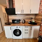 Возможность самостоятельного приготовления пищи, Апартаменты KM-Studios