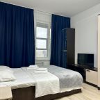 Четырехместный (Семейный однокомнатный номер с балконом и кухней.), Апарт-отель NV.Hotel