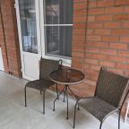 Стол и стулья у каждого номера