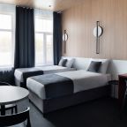 Студия с кухней с двумя односпальными кроватями