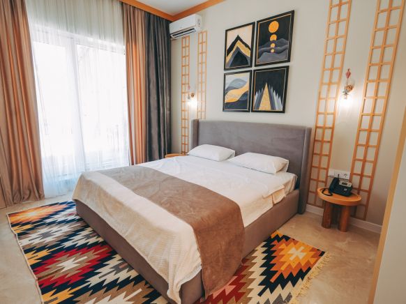 Фотография номера гостиницы Амагал