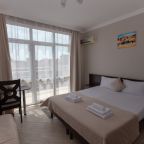 Трёхместный и более (Стандартный с балконом (3)), Гостевой дом Лидер