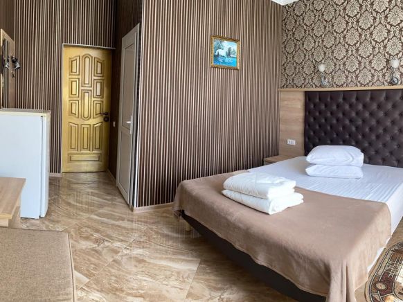 Фотография номера мини отеля На Коллективной