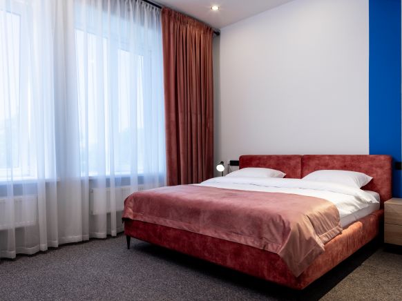 Фотография номера гостиницы Беной Тревел