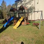 Детская площадка с горками, качелями, лестницами., База отдыха Спорталия