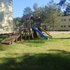 Детская площадка с горками, качелями, лестницами., База отдыха Спорталия