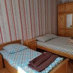 Двухместный (Одноместный двухкомнатный номер с кухней и дополнительной кроватью), Гостиница Гостель