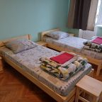 Трёхместный и более (Трехместный двухкомнатный номер с кухней и дополнительной кроватью), Гостиница Гостель