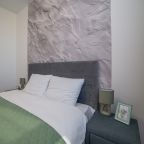 Апартаменты (Красных Командиров 1в), Апартаменты Красных командиров 1в