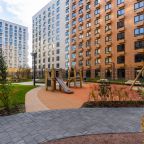 На детской площадке в закрытом дворе (без машин), Апартаменты Уютные в центре Санкт-Петербурга