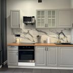 Возможность самостоятельного приготовления пищи, Апартаменты Для четверых в центральном районе