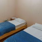 Спальня с двумя односпальными кроватями