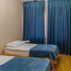 Спальня с двумя односпальными кроватями