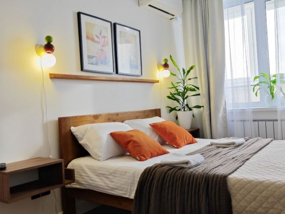 Апартаменты Классный Домик. 1-комнатные с видом на город и облака