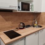 Мини-кухня, Апартаменты Уютная студия в центре Санкт-Петербурга