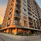 Здание на Закате - в торце Люксы