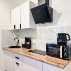 В каждом номере представлена своя кухонная зона , Гостевой дом Апарт Июль