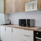 Возможность самостоятельного приготовления пищи, Апартаменты Просторная студия у цирка