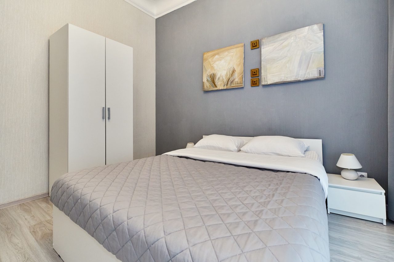 Двух спальная кровать в апартаментах 55 м2