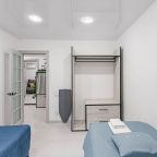 Спальня с двумя раздельными удобн кроватями для двоих гостей