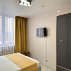 Спальное место. ТВ. Шкаф.