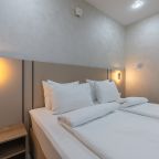 Четырехместный (Улучшенные четырехместные апартаменты 2+2 | Superior apt QUAD 2+2), Апарт-отель Аура