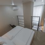 Четырехместный (Улучшенные четырехместные апартаменты 2+2 | Superior apt QUAD 2+2), Апарт-отель Аура