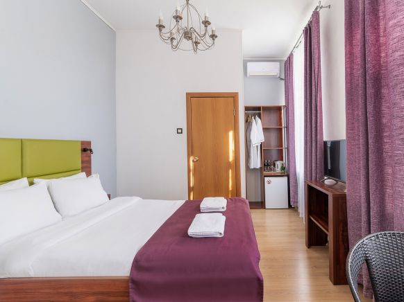 Фотография номера гостиницы Teplo Отель