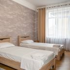 Трёхместный и более (Двухкомнатный с 2-мя односпальными кроватями), Гостевой дом Великий Каспий