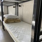 Кровать в комфортном 8-ми местном номере