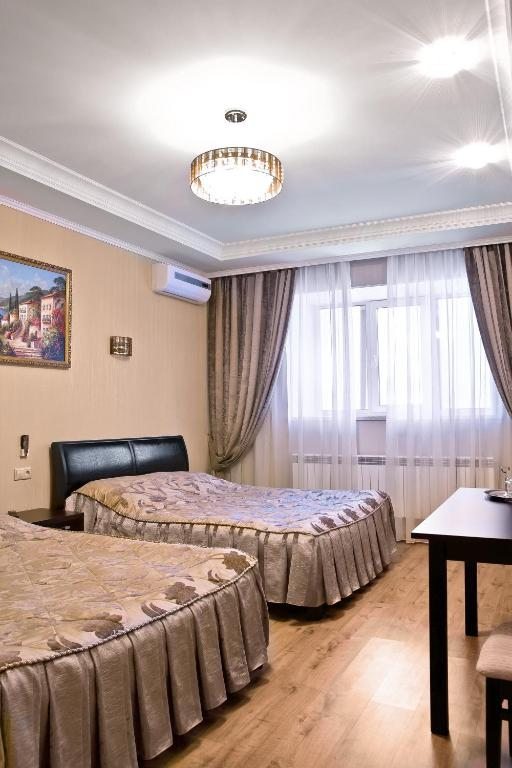 Двухместный (Улучшенный двухместный номер с 2 отдельными кроватями) гостиницы Лазурный берег, Тюмень