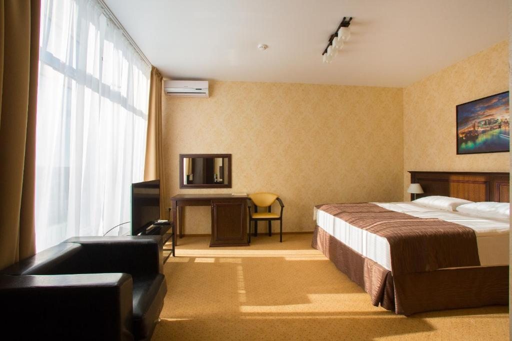 Двухместный (Улучшенный номер с кроватью размера «king-size» - Категория 1) гостиницы Riposo, Краснодар