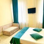 Уютные светлые номера с высокими потолками.