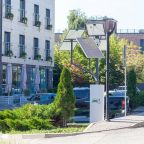 Парковка и станция зарядки для электромобилей, Ракурс Отель