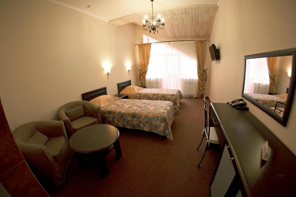 Двухместный (Стандартный двухместный номер с 1 кроватью или 2 отдельными кроватями) отеля Маяк, Якты-Куль