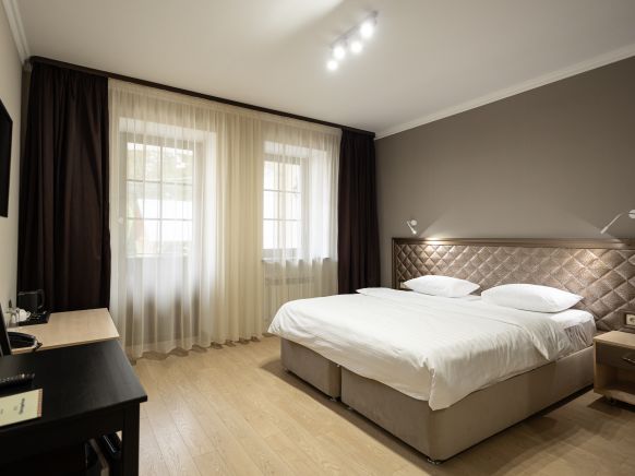 Фотография номера гостиницы Тройка