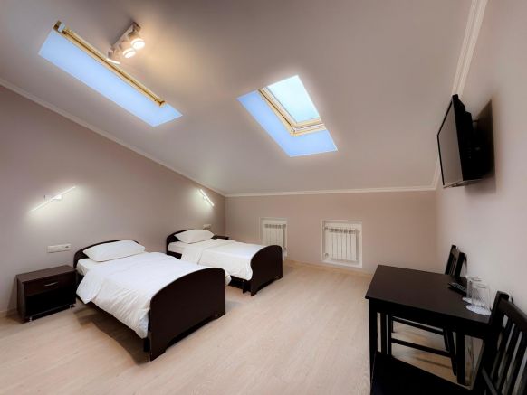 Фотография номера гостиницы Тройка