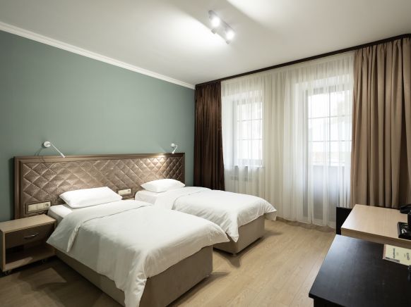 Фотография номера гостиницы Тройка