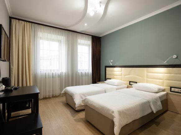 Фотография номера гостиницы Тройка