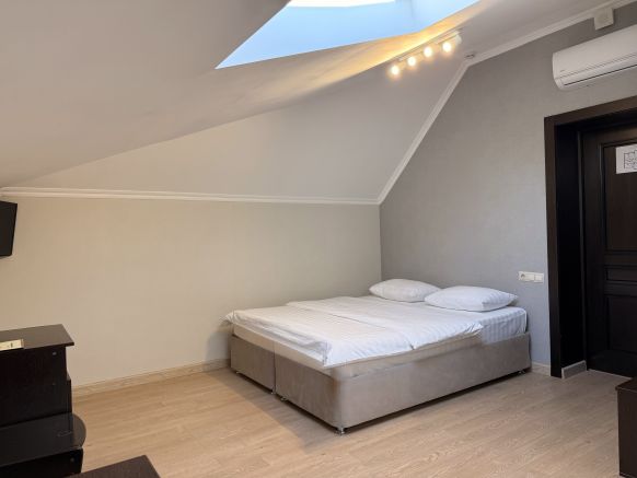 Фотография номера гостиницы Тройка