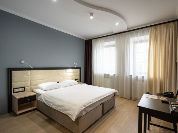 Фотография номера гостиницы Тройка