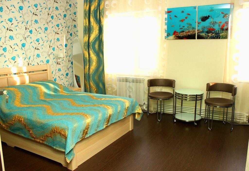 Двухместный (Улучшенный двухместный номер с 1 кроватью) гостевого дома Восторг, Якутск