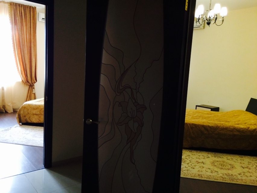 Четырехместный (2-х комнатный номер с двуспальными кроватями) гранд отеля Каспий, Каспийск