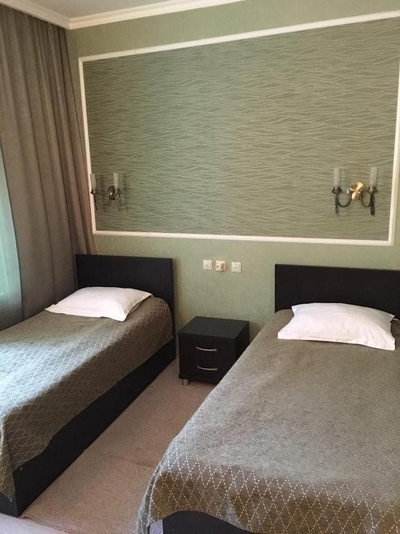 Двухместный (Двухместный номер с 2 отдельными кроватями и душем) гостиницы Sky Азау, Терскол