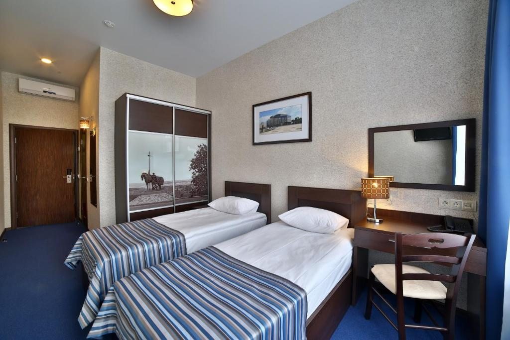 Двухместный (Стандартный двухместный номер с 2 отдельными кроватями) отеля HELIOPARK Cruise, Пенза