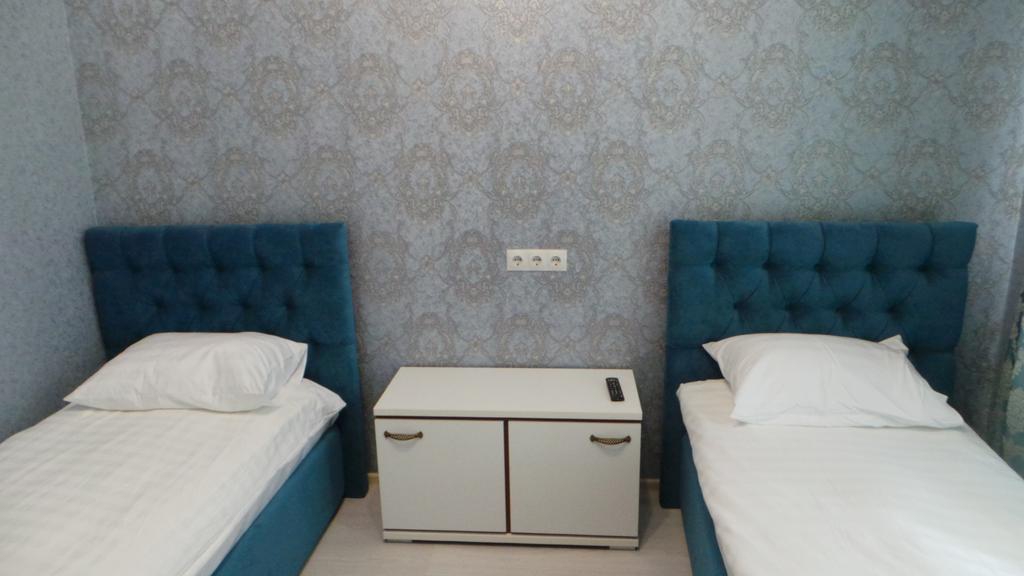 Двухместный (Стандарт с 2 отдельными кроватями) отеля Elite, Волгоград