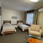 Двухместный (Комфорт "Плюс" с двумя отдельными кроватями), Гостиница Строитель