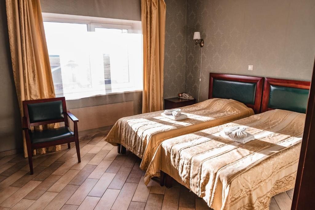 Двухместный (Номер Делюкс с 2 кроватями размера «queen-size») отеля Метелица, Усть-Ордынский