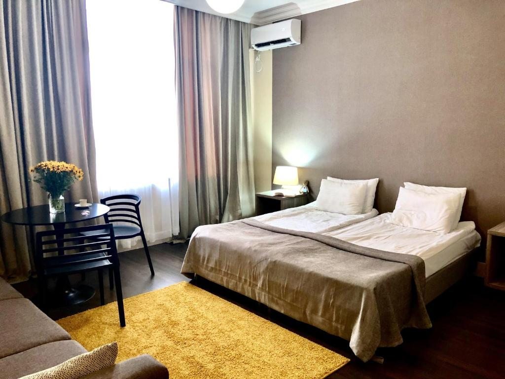 Двухместный (Большой двухместный номер с 1 кроватью или 2 отдельными кроватями) отеля Amra, Сухум