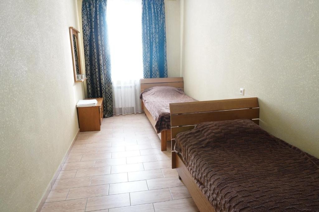 Двухместный (Двухместный номер эконом-класса с 2 отдельными кроватями) отеля Лазурное, Суровикино